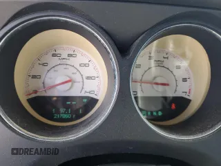 2011 Dodge Challenger z VIN 2B3CJ4DG9BH570202, wystawiony jako Copart lot #73284844 z przebiegiem 217 850 mil mil oraz Szkoda całkowita • Salvage title. Historia ofert i sprzedaży dostępna na DreamBid. Obrazek 9.