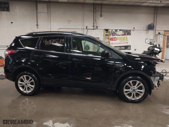 2017 Ford Escape SE with VIN 1FMCU9GDXHUA07522, listed as a IAAI auction lot 40875214 with 114,175 mi miles. Bid and sale history available at carsss.com. Image 14.