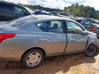2012 Nissan Versa SV with VIN 3N1CN7AP1CL811531, listed as a IAAI auction lot 40465017 with 173,736 mi miles and . Bid and sale history available at DreamBid. Image 13.