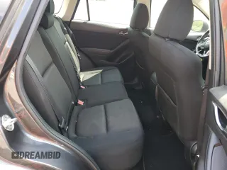 2016 Mazda CX-5 Sport z VIN JM3KE2BY4G0632946, wystawiony jako Copart lot #61447435 z przebiegiem 178 492 mil mil oraz Szkoda całkowita • Salvage title. Historia ofert i sprzedaży dostępna na DreamBid. Obrazek 11.