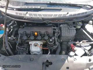 2009 Honda Civic Cpe EX with VIN 2HGFG11849H511687, listed as a IAAI auction lot 41657196 with 127,583 mi miles. Bid and sale history available at carsss.com. Image 10.