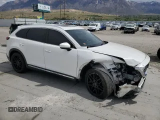 2016 Mazda CX-9 Signature with VIN JM3TCBEY7G0118322, listed as a Copart auction lot 54826655 with 123,618 mi miles and Salvage title. Bid and sale history available at DreamBid. Image 4.