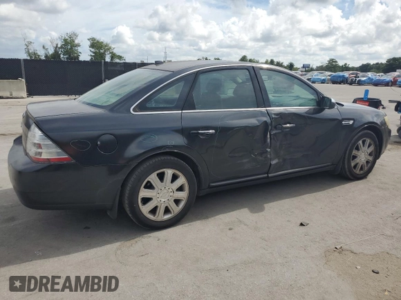 2008 Ford Taurus Limited with VIN 1FAHP25W78G128851, listed as a Copart auction lot 61254015 with 216,335 mi miles and Salvage title. Bid and sale history available at DreamBid. Image 3.
