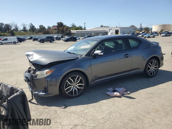 2014 Scion tC with VIN JTKJF5C7XE3085579, listed as a Copart auction lot 52431165 with 44,421 mi miles and Salvage Title. Bid and sale history available at carsss.com. Image 1.