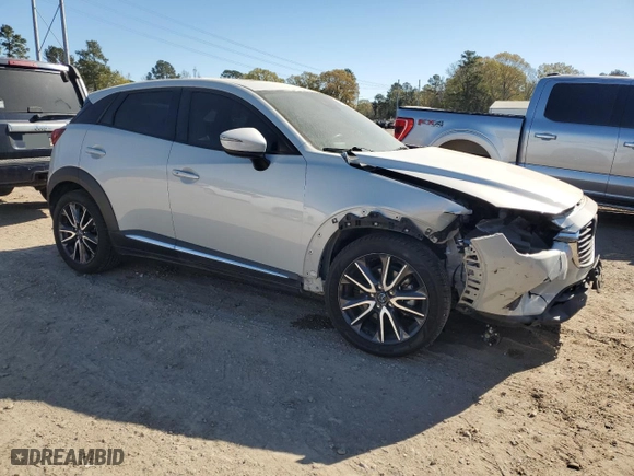 2018 Mazda CX-3 Grand Touring with VIN JM1DKFD77J0310587, listed as a Copart auction lot 49443755 with 70,897 mi miles and Salvage Title. Bid and sale history available at carsss.com. Image 4.
