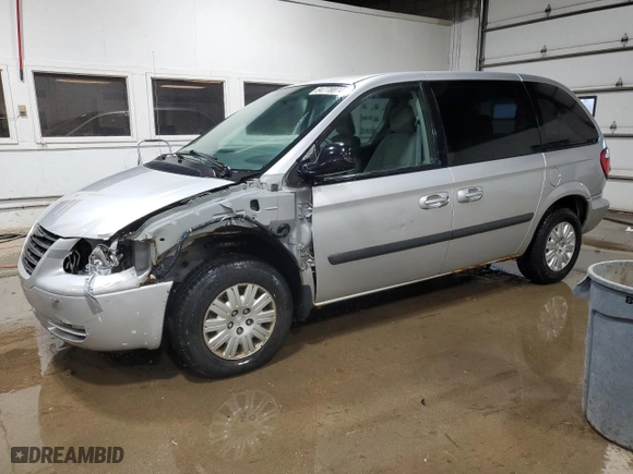 2006 Chrysler Town & Country SWB with VIN 1A4GP45R76B740211, listed as a Copart auction lot 84770074 with 52,557 mi miles and Clean Title. Bid and sale history available at carsss.com. Image 1.