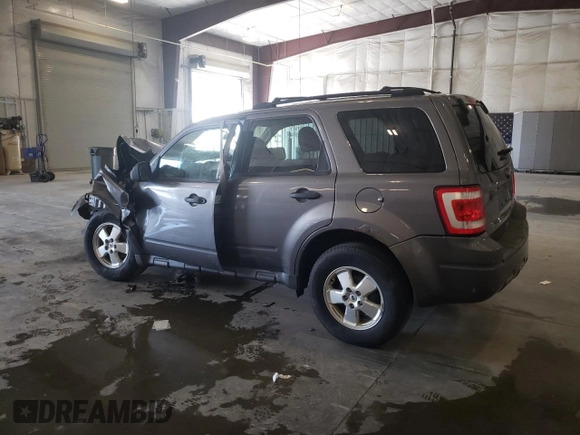 2011 Ford Escape XLS with VIN 1FMCU0C75BKB73848, listed as a Copart auction lot 55879105 with Not provided miles and Non repairable. Bid and sale history available at DreamBid. Image 2.