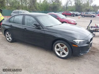 2014 BMW 3 Series 320i xDrive with VIN WBA3C3G5XENS68374, listed as a IAAI auction lot 42042243 with 107,830 mi miles. Bid and sale history available at carsss.com. Image 1.