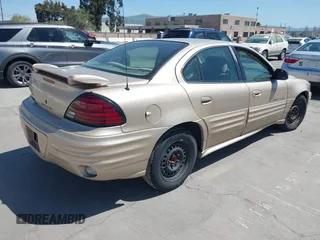 2001 Pontiac Grand Am SE1 with VIN 1G2NF52T91M593817, listed as a IAAI auction lot 41966971 with 251,709 mi miles. Bid and sale history available at carsss.com. Image 4.