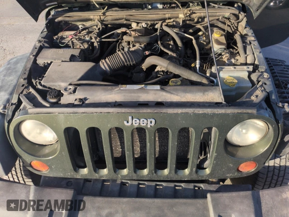 2008 Jeep Wrangler Unlimited X with VIN 1J4GA39108L509275, listed as a Copart auction lot 52386455 with 220,829 mi miles and Salvage Title. Bid and sale history available at carsss.com. Image 12.