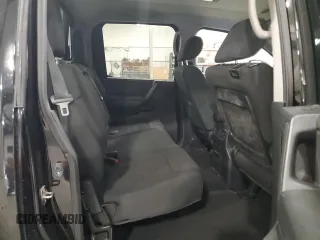 2013 Nissan Titan Pro-4X с VIN 1N6AA0EC2DN311987, выставлен на аукционе Copart как лот 50187565 с пробегом 158 838 миль миль и Списание • Salvage title. История ставок и продаж доступна на DreamBid. Изображение 10.