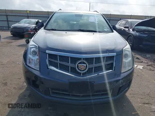 2012 Cadillac SRX Luxury Collection z VIN 3GYFNAE39CS659562, wystawiony jako IAAI lot #42109525 z przebiegiem 151 051 mil mil oraz . Historia ofert i sprzedaży dostępna na DreamBid. Obrazek 12.