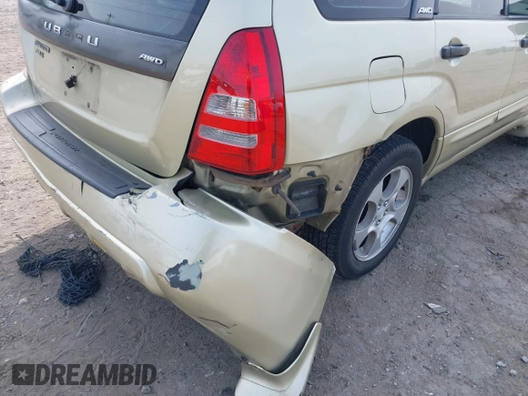 2003 Subaru Forester XS with VIN JF1SG65673H761883, listed as a IAAI auction lot 41775424 with 167,500 mi miles. Bid and sale history available at carsss.com. Image 6.