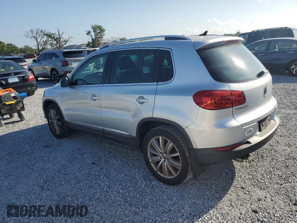 2012 Volkswagen Tiguan SE with VIN WVGAV7AX9CW607599, listed as a Copart auction lot 51214455 with 131,109 mi miles and Salvage Title. Bid and sale history available at DreamBid. Image 2.