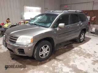 2004 Mitsubishi Endeavor XLS z VIN 4A4MN31S44E054150, wystawiony jako IAAI lot #41867238 z przebiegiem 200 239 mil mil oraz . Historia ofert i sprzedaży dostępna na DreamBid. Obrazek 2.
