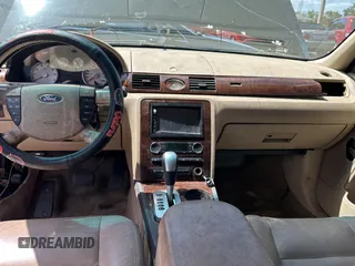 2005 Ford Five Hundred SEL z VIN 1FAFP24185G146669, wystawiony jako Copart lot #51990845 z przebiegiem Nie podano mil oraz Czysty tytuł • Clean title. Historia ofert i sprzedaży dostępna na DreamBid. Obrazek 9.