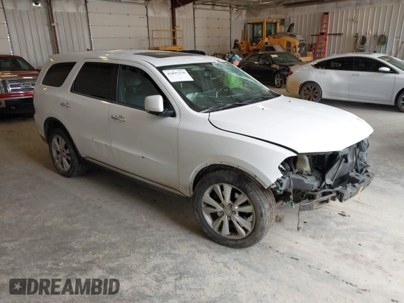 2013 Dodge Durango Crew z VIN 1C4SDJDT3DC540700, wystawiony jako IAAI lot #42097270 z przebiegiem 197 195 mil mil oraz . Historia ofert i sprzedaży dostępna na DreamBid. Obrazek 1.
