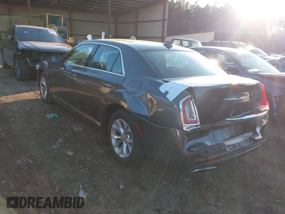 2016 Chrysler 300 Limited with VIN 2C3CCAAG5GH151450, listed as a IAAI auction lot 41253553 with 146,669 mi miles. Bid and sale history available at carsss.com. Image 3.