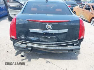 2012 Cadillac CTS with VIN 1G6DA5E56C0124667, listed as a IAAI auction lot 42051436 with 100,836 mi miles and . Bid and sale history available at DreamBid. Image 6.