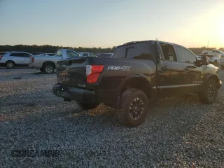 2019 Nissan Titan Pro-4X z VIN 1N6AA1E53KN525603, wystawiony jako Copart lot #77336264 z przebiegiem 64 507 mil mil oraz Szkoda całkowita • Salvage title. Historia ofert i sprzedaży dostępna na DreamBid. Obrazek 3.