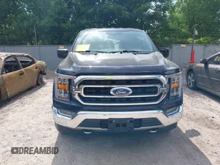 2021 Ford F-150 XL z VIN 1FTFW1E5XMFA57179, wystawiony jako IAAI lot #42561205 z przebiegiem 90 517 mil mil oraz . Historia ofert i sprzedaży dostępna na DreamBid. Obrazek 12.
