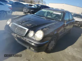 1999 Mercedes-Benz E-Class with VIN WDBJF65H4XA726371, listed as a Copart auction lot 88732175 with 132,477 mi miles and Salvage Title. Bid and sale history available at carsss.com. Image 1.