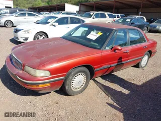 1999 Buick LeSabre Custom with VIN 1G4HP52KXXH467914, listed as a IAAI auction lot 41968586 with 159,680 mi miles. Bid and sale history available at carsss.com. Image 2.