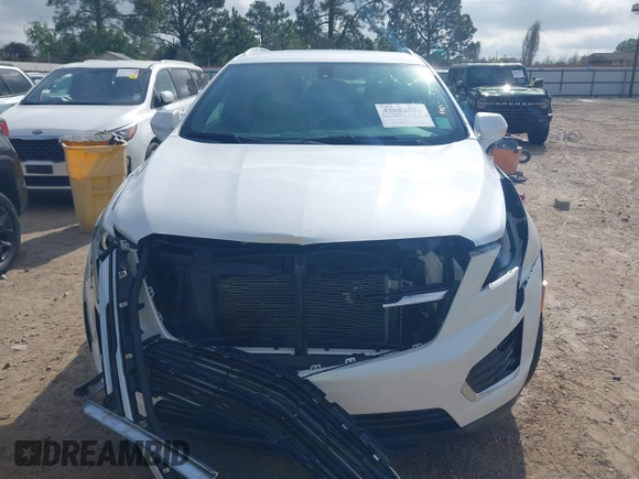 2017 Cadillac XT5 FWD with VIN 1GYKNARS0HZ107734, listed as a IAAI auction lot 41882031 with 89,397 mi miles. Bid and sale history available at carsss.com. Image 13.