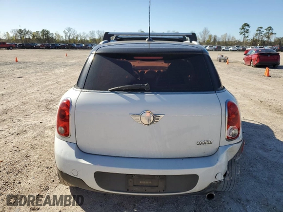 2011 MINI Countryman with VIN WMWZB3C59BWH94541, listed as a Copart auction lot 87177514 with 186,979 mi miles and Salvage title. Bid and sale history available at DreamBid. Image 6.