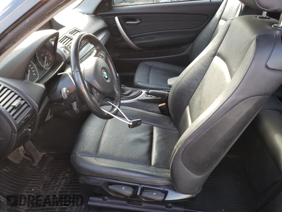 2009 BMW 1 Series 128i with VIN WBAUP73529VK75976, listed as a Copart auction lot 75642404 with 131,653 mi miles and Salvage Title. Bid and sale history available at carsss.com. Image 7.