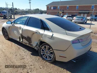 2016 Lincoln MKZ z VIN 3LN6L2J94GR611830, wystawiony jako IAAI lot #41264148 z przebiegiem 155 065 mil mil oraz . Historia ofert i sprzedaży dostępna na DreamBid. Obrazek 3.