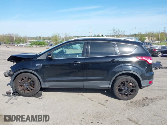 2016 Ford Escape Titanium with VIN 1FMCU9J94GUA06028, listed as a IAAI auction lot 42102769 with 88,278 mi miles. Bid and sale history available at carsss.com. Image 15.