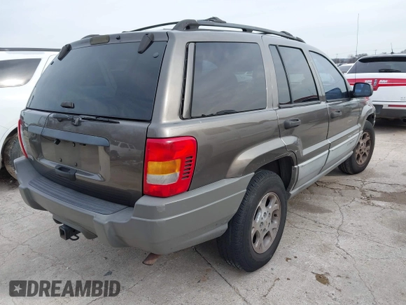 1999 Jeep Grand Cherokee Laredo с VIN 1J4G258S8XC650533, выставлен на аукционе IAAI как лот 41583331 с пробегом 245 164 миль миль и . История ставок и продаж доступна на DreamBid. Изображение 4.
