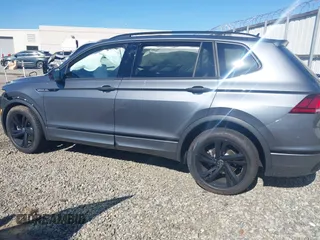 2024 Volkswagen Tiguan SE R-Line Black with VIN 3VVCB7AX2RM114556, listed as a IAAI auction lot 41887373 with 7,013 mi miles and . Bid and sale history available at DreamBid. Image 14.
