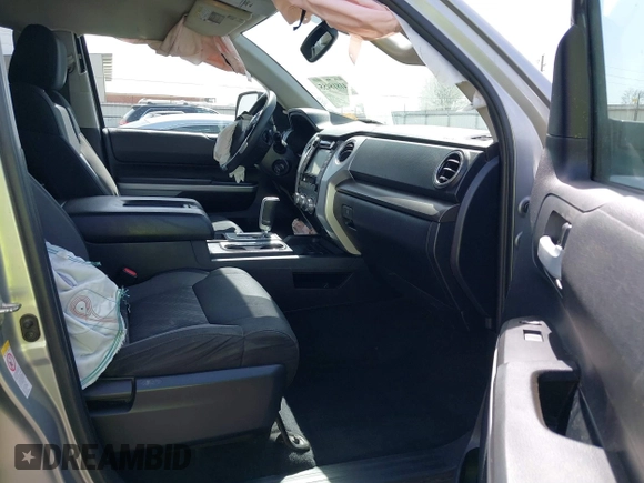 2018 Toyota Tundra 2WD SR with VIN 5TFRM5F16JX133735, listed as a IAAI auction lot 41818455 with 148,456 mi miles. Bid and sale history available at carsss.com. Image 5.