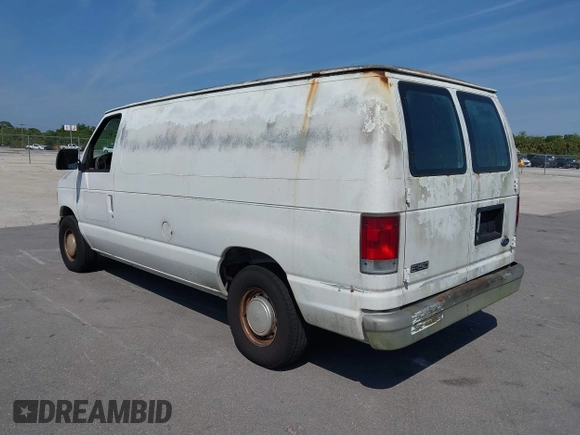 1999 Ford Econoline Cargo with VIN 1FTRE1428XHA20390, listed as a IAAI auction lot 41806875 with 207,954 mi miles. Bid and sale history available at carsss.com. Image 3.