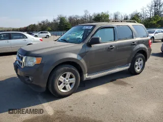 2011 Ford Escape Hybrid with VIN 1FMCU4K35BKA16469, listed as a Copart auction lot 65811905 with 401,583 mi miles and Clean title. Bid and sale history available at DreamBid. Image 1.