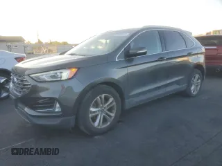 2019 Ford Edge SEL z VIN 2FMPK3J92KBB90145, wystawiony jako Copart lot #60288155 z przebiegiem 96 790 mil mil oraz Czysty tytuł • Clean title. Historia ofert i sprzedaży dostępna na DreamBid. Obrazek 1.