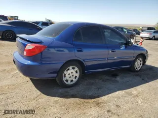 2002 Kia Rio with VIN KNADC123X26125297, listed as a Copart auction lot 74368764 with 72,025 mi miles and Salvage Title. Bid and sale history available at carsss.com. Image 3.