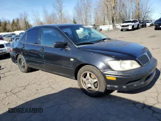 2002 Mitsubishi Lancer OZ-Rally with VIN JA3AJ86E92U027551, listed as a Copart auction lot 45020575 with 214,575 mi miles and Salvage Title. Bid and sale history available at carsss.com. Image 4.