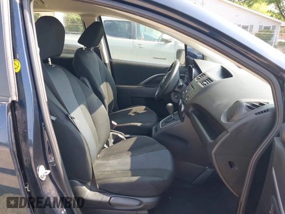2015 Mazda 5 Sport z VIN JM1CW2BL9F0187973, wystawiony jako IAAI lot #42378711 z przebiegiem 97 543 mil mil oraz . Historia ofert i sprzedaży dostępna na DreamBid. Obrazek 5.