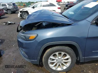 2020 Jeep Cherokee Latitude z VIN 1C4PJLCB7LD631903, wystawiony jako IAAI lot #42523873 z przebiegiem 49 651 mil mil oraz . Historia ofert i sprzedaży dostępna na DreamBid. Obrazek 19.