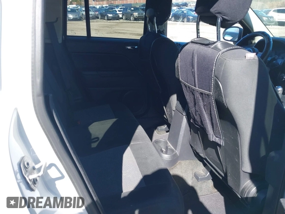 2016 Jeep Compass Sport with VIN 1C4NJDBB6GD647367, listed as a IAAI auction lot 41818920 with 169,037 mi miles and . Bid and sale history available at carsss.com. Image 8.