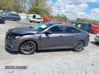 2021 Honda Civic Sedan EX with VIN 19XFC1F33ME012262, listed as a IAAI auction lot 41880047 with 67,861 mi miles. Bid and sale history available at carsss.com. Image 14.