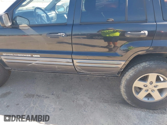 2004 Jeep Grand Cherokee Laredo z VIN 1J4GX48S04C281660, wystawiony jako IAAI lot #42551161 z przebiegiem 173 209 mil mil oraz . Historia ofert i sprzedaży dostępna na DreamBid. Obrazek 6.