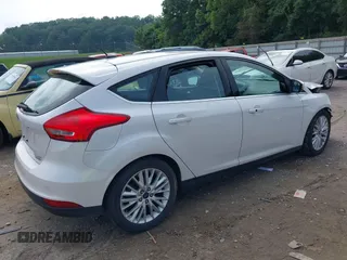 2015 Ford Focus Titanium with VIN 1FADP3N22FL365477, listed as a IAAI auction lot 37461727 with Not provided miles and . Bid and sale history available at DreamBid. Image 4.