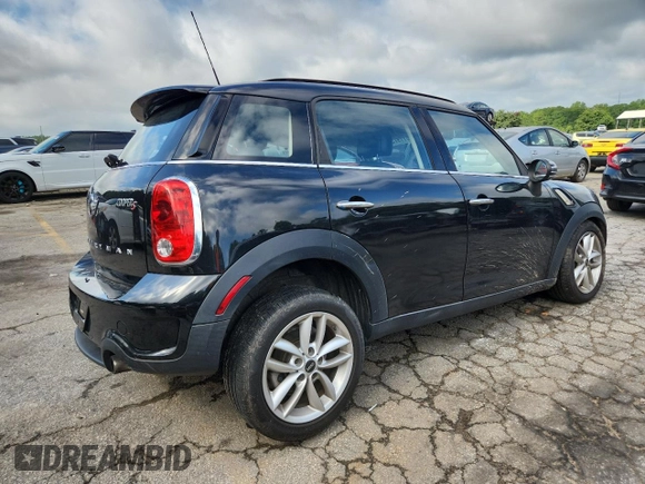 2014 MINI Countryman S with VIN WMWZC3C56EWP25479, listed as a Copart auction lot 61197525 with 101,146 mi miles and Salvage title. Bid and sale history available at DreamBid. Image 3.