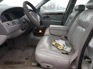 2001 Lincoln Town Car Cartier z VIN 1LNHM83W81Y629753, wystawiony jako Copart lot #36916024 z przebiegiem 150 875 mil mil oraz Szkoda całkowita • Salvage title. Historia ofert i sprzedaży dostępna na DreamBid. Obrazek 7.