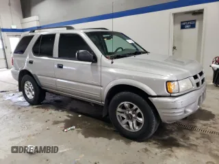 2004 Isuzu Rodeo S z VIN 4S2CK58W144306785, wystawiony jako Copart lot #85124684 z przebiegiem 296 433 mil mil oraz Szkody całkowita. Historia ofert i sprzedaży dostępna na DreamBid. Obrazek 4.
