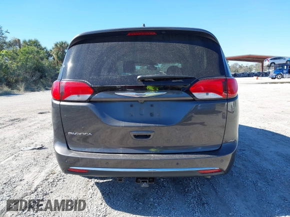2017 Chrysler Pacifica Touring L z VIN 2C4RC1BG2HR741427, wystawiony jako IAAI lot #41299887 z przebiegiem 69 219 mil mil oraz . Historia ofert i sprzedaży dostępna na DreamBid. Obrazek 16.